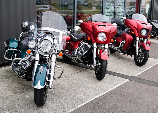 three cruiser motorcycles